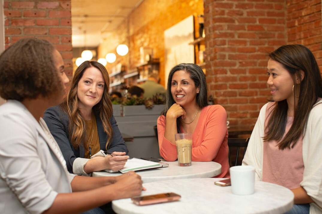 group of friends discussing trends