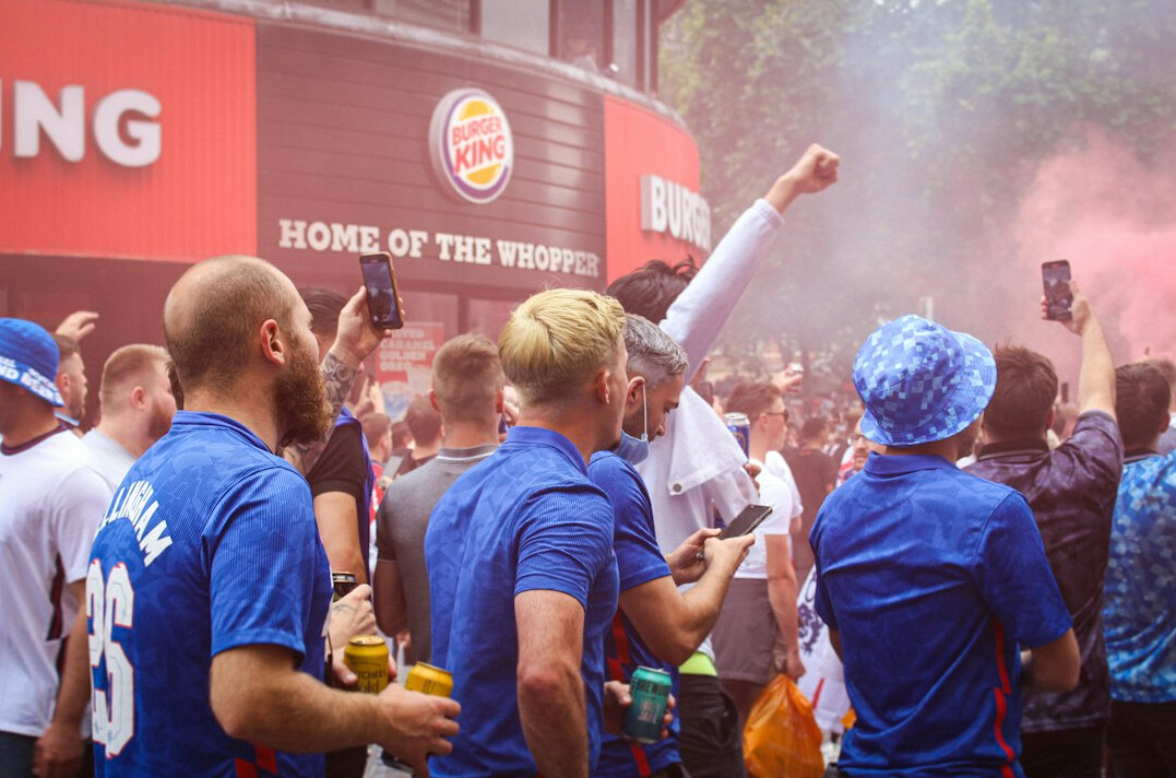 group of fans cheering